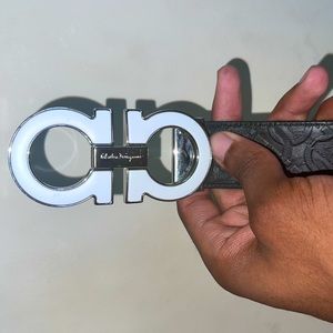Barely used Ferragamo belt. Double sided colors (white or black).